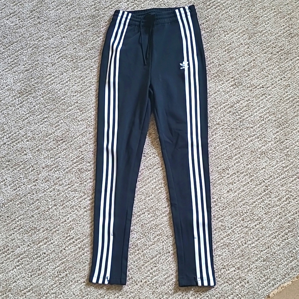 Adidas track or soccer pants. Size small.